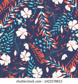 Summer trend seamless pattern with tropical leaves and flowers on a dark background. Vector design. Jung print. Floral background. Printing and textiles.