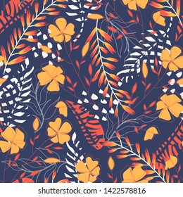 Summer trend seamless pattern with tropical leaves and flowers on a dark blue background. Vector design. Jung print. Floral background. Printing and textiles.