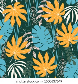 Summer tropical seamless pattern with blue and yellow leaves. Jungle print, print, fabric, Wallpaper. Botanical pattern, Hawaii. Colorful plants pattern.