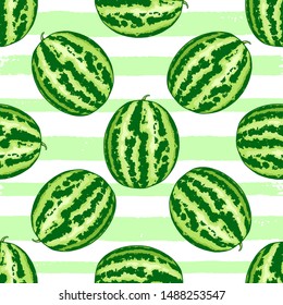 Summer tropical seamless pattern with watermelon on a green striped background. Hand drawn vector illustration
