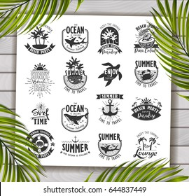 Summer Typography Design Collection - A set of sixteen vintage style Summer Designs on wooden background with palm leaves