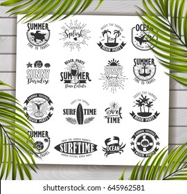 Summer Typography Design Collection - A set of sixteen vintage style Summer Designs on wooden background with palm leaves