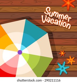 Summer vacation background with beach umbrella and starfishes on wooden pier
