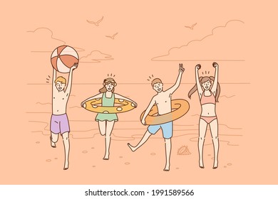 Summer vacations and activities concept. Group of happy children friends cartoon characters jumping on beach wearing swimsuits feeling excited vector illustration 