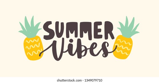 Summer Vibes lettering handwritten with cursive calligraphic font and decorated by pineapples. Trendy summertime composition with tropical fruits. Modern flat vector illustration for t-shirt print.