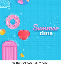 Summertime background. Colorful inflatable swim ring float in the swimming pool with text and copy space on blue background.