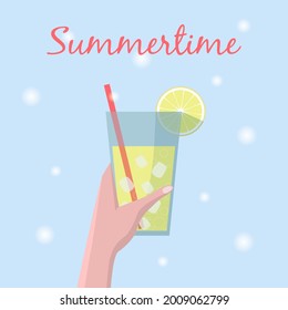 Summertime. Cold lemonade with ice in hand on blue background
