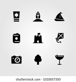 Summertime vector icon set. cocktail, sailboat, sand castle and tree