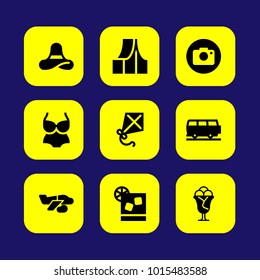 Summertime vector icon set. photo camera, kite and swimsuit