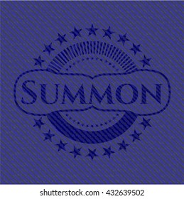 Summon badge with denim background