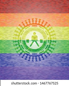 sumo deadlift icon inside emblem on mosaic background with the colors of the LGBT flag