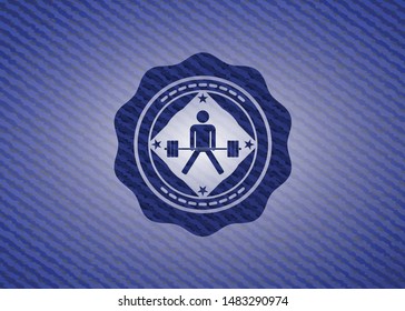 sumo deadlift icon inside emblem with jean texture