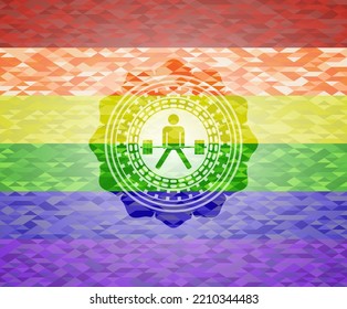 sumo deadlift icon inside emblem on mosaic background with the colors of the LGBT flag. 