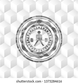 sumo deadlift icon inside grey emblem with geometric cube white background