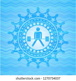 sumo deadlift icon inside light blue water wave emblem background.