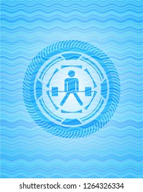 sumo deadlift icon inside sky blue water wave emblem background.