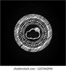 sun behind cloud icon with chalkboard texture