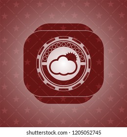 sun behind cloud icon inside red emblem