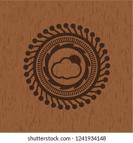 sun behind cloud icon inside retro style wood emblem