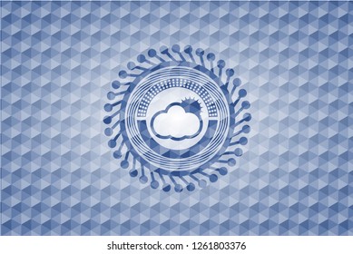 sun behind cloud icon inside blue badge with geometric pattern.