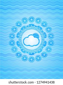 sun behind cloud icon inside light blue water badge background.