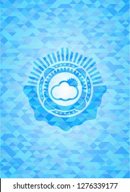 sun behind cloud icon inside light blue emblem with triangle mosaic background