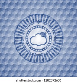 sun behind cloud icon inside blue badge with geometric pattern.