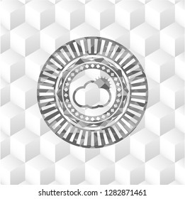sun behind cloud icon inside grey badge with geometric cube white background