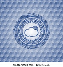 sun behind cloud icon inside blue polygonal badge.