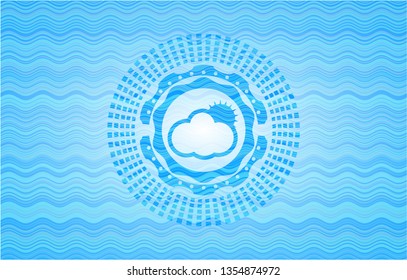 sun behind cloud icon inside water wave representation style badge.