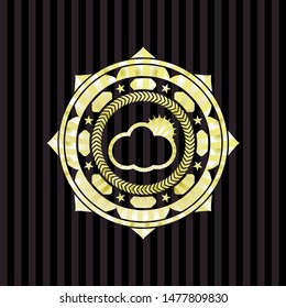 sun behind cloud icon inside gold emblem or badge