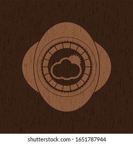 sun behind cloud icon inside wooden emblem