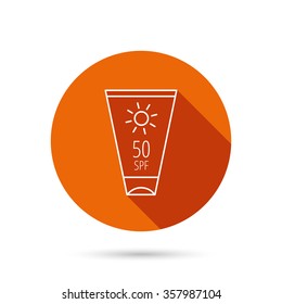Sun cream container icon. Beach lotion sign. Round orange web button with shadow.