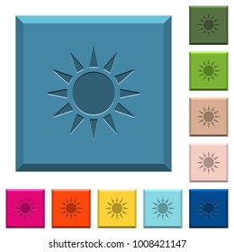 Sun engraved icons on edged square buttons in various trendy colors