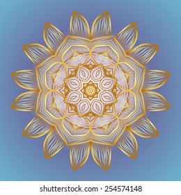The sun in the form of a yellow circular ornament on blue sky background.