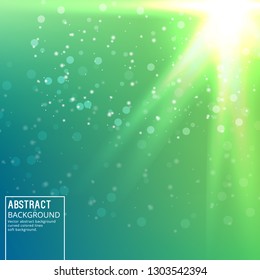 Sun Glare on Soft Green Background. Abstract Background with Bokeh Effect.