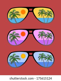 sun glasses with tropical beach reflection