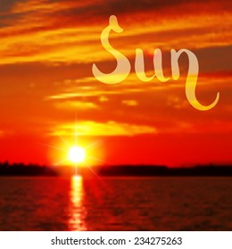 Sun hand drawn design on blurred sunset photo background