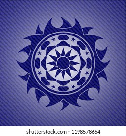 sun icon with denim texture