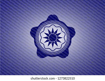 sun icon with denim texture