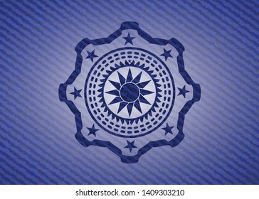 sun icon with denim texture