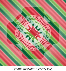 sun icon inside christmas emblem.
