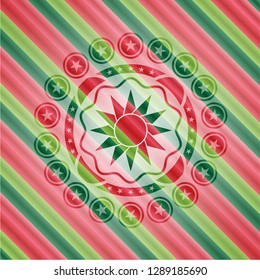 sun icon inside christmas style emblem.