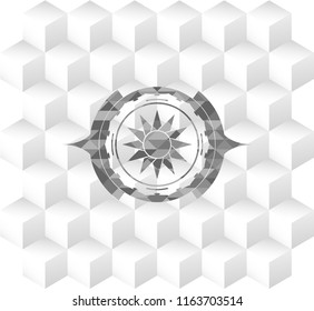 sun icon inside grey emblem with geometric cube white background