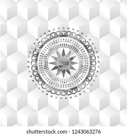 sun icon inside grey emblem with cube white background
