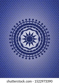 sun icon inside jean or denim emblem or badge background