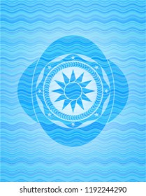 sun icon inside light blue water emblem.