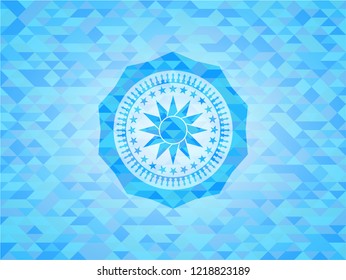 sun icon inside light blue emblem with triangle mosaic background