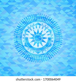 sun icon inside light blue emblem. Mosaic background