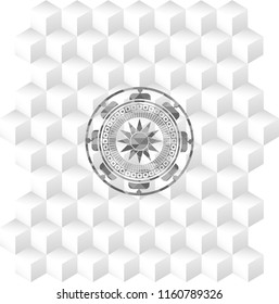 sun icon inside realistic grey emblem with cube white background